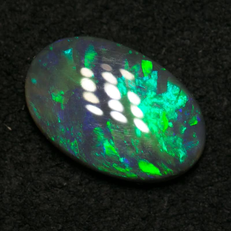 0.78 ct black opal 9x6x2mm - Image 3