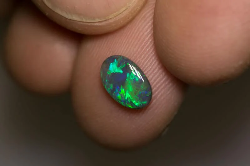 0.78 ct black opal 9x6x2mm - Image 4