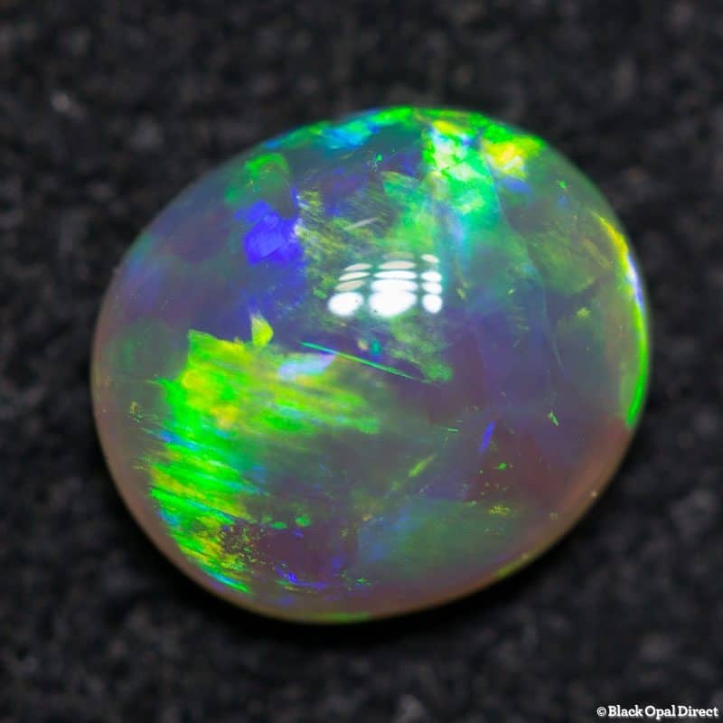 0.78 ct crystal opal 7x6x3mm - Image 2
