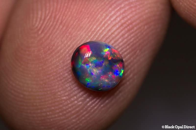 0.78 ct gem black opal 7x6x3mm - Image 2