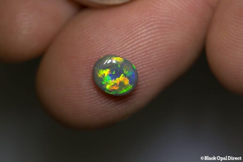 0.78 ct semi black opal 7x6x3mm - Image 2