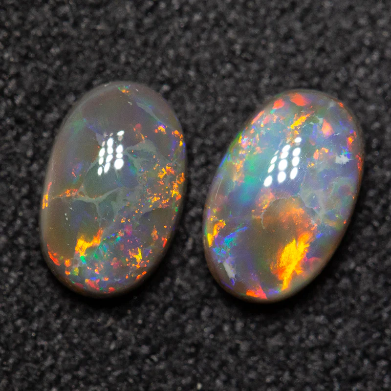 0.79 ct black opal 5.9x3.8x2.4mm - Image 2