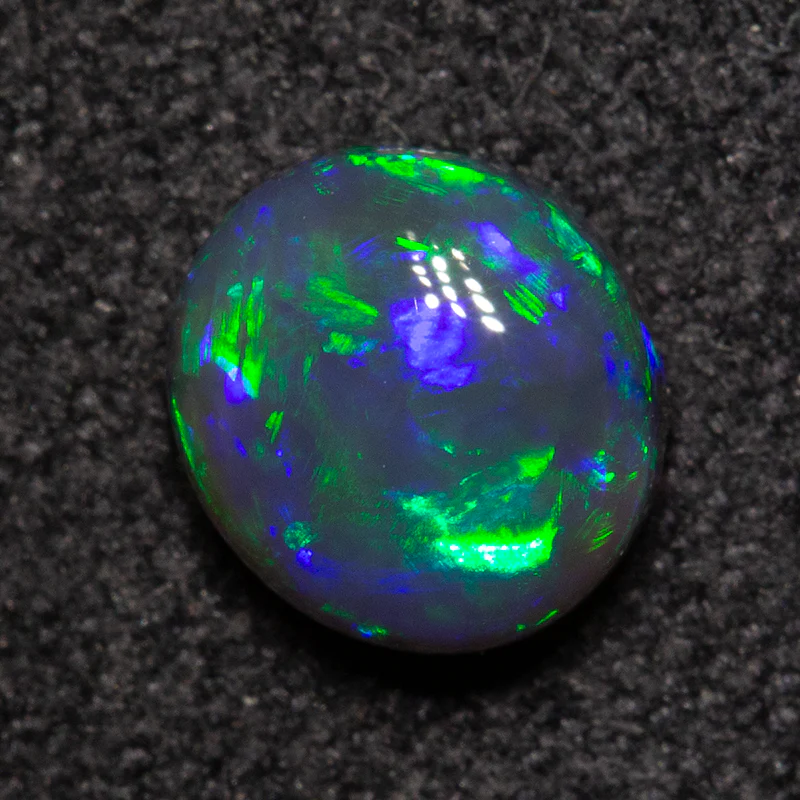0.79 ct black opal 6.2x5.7x3.4mm - Image 2