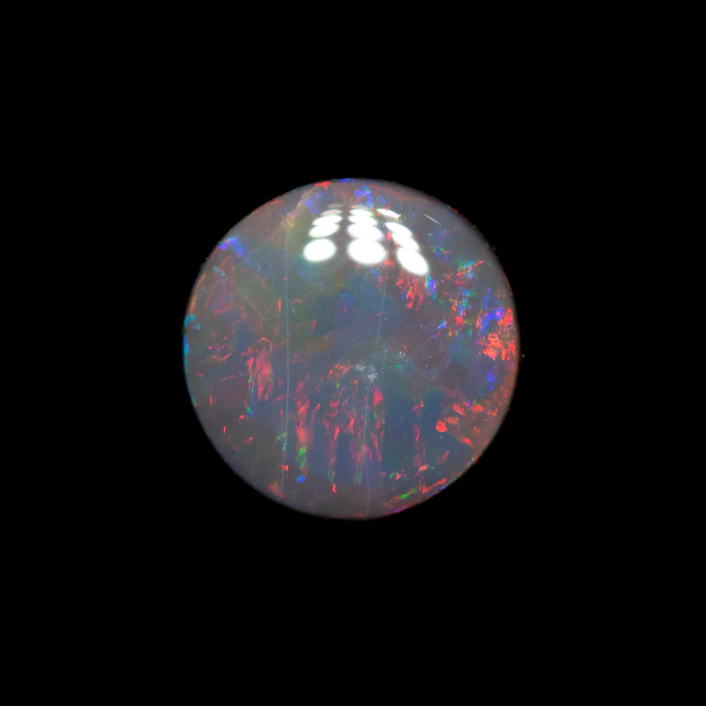 0.79 ct black opal 6.6x6.5x2.7mm - Image 2