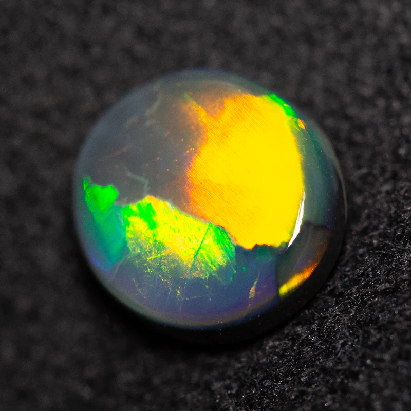 0.79 ct black opal 6.9x6.4x2.5mm - Image 3