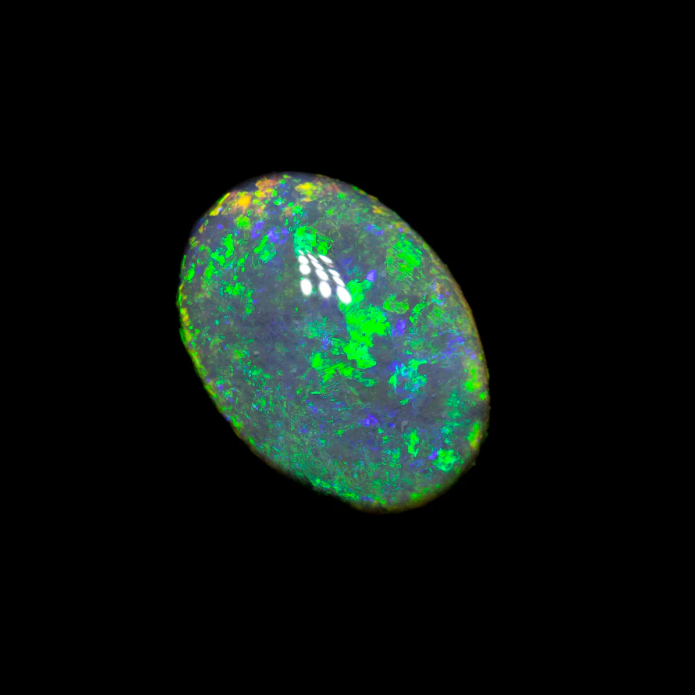 0.79 ct black opal 7.4x5.3x3.2mm - Image 2