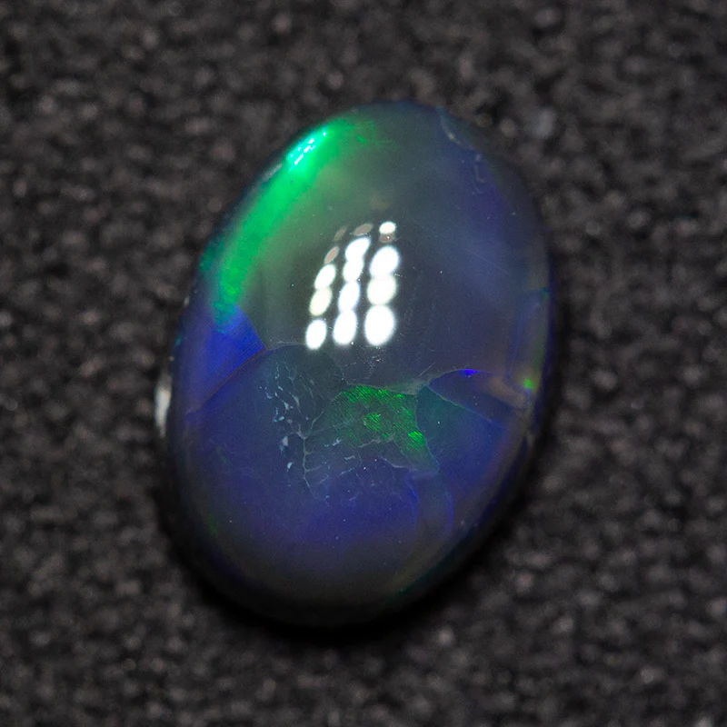0.79 ct black opal 7x5.5x3mm - Image 3