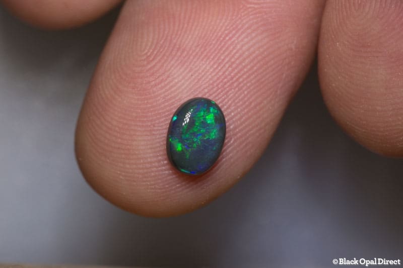 0.79 ct black opal 7x5x2mm - Image 2