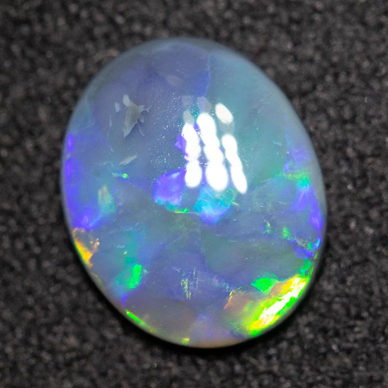 0.79 ct black opal 8.5x7x2mm - Image 3