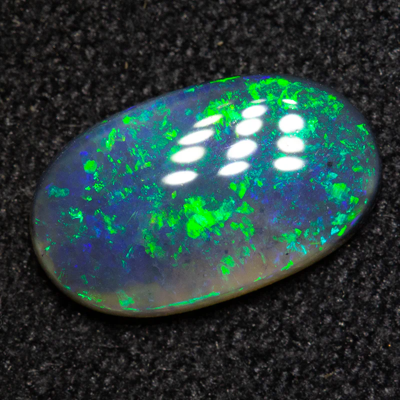 0.79 ct black opal 9.4x5.6x2mm - Image 2