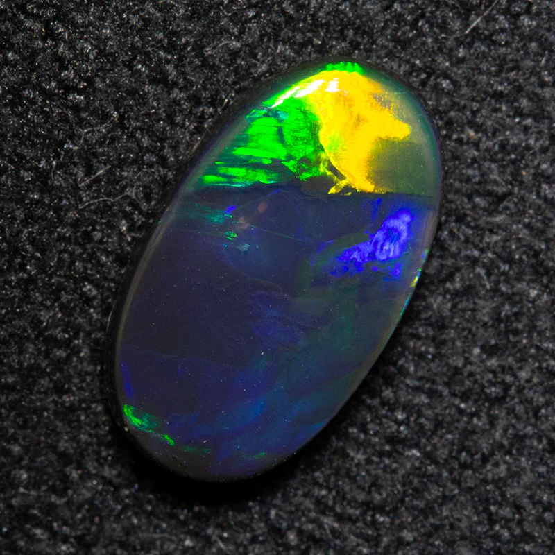 0.79 ct black opal 9x5.2x2.3mm - Image 2
