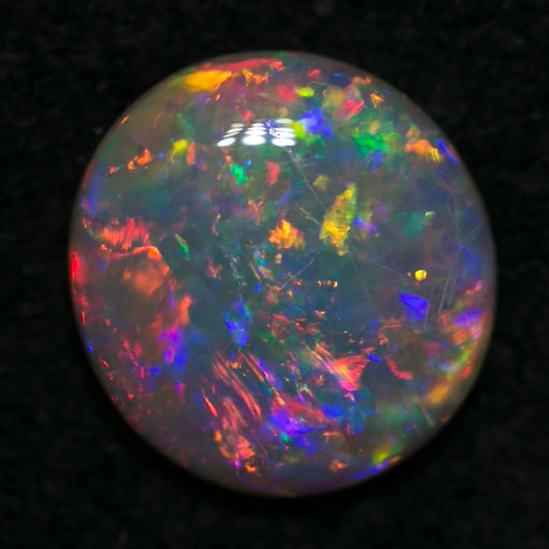 0.79 ct crystal opal 7x6.5x2mm - Image 3