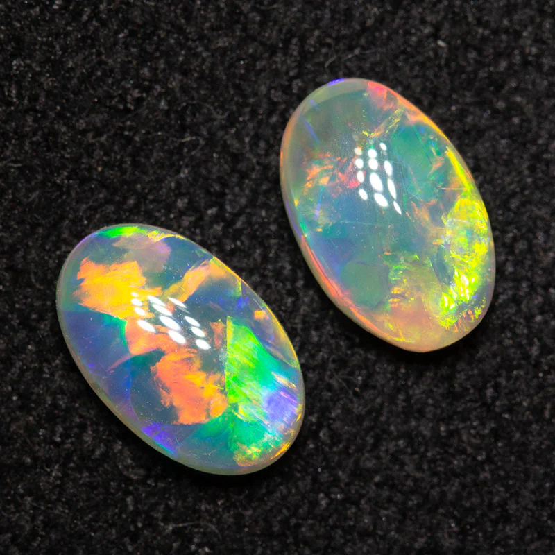 0.79 ct crystal opal pair 6.6x4.2x2.4mm - Image 2