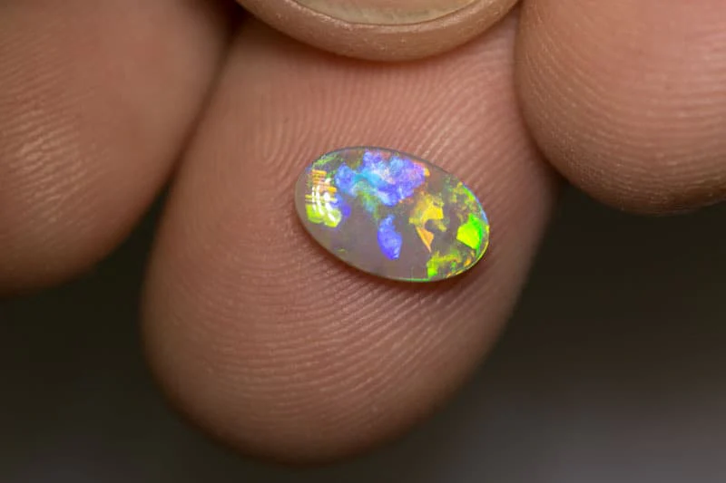 0.79 ct dark opal 10x6x2mm - Image 3