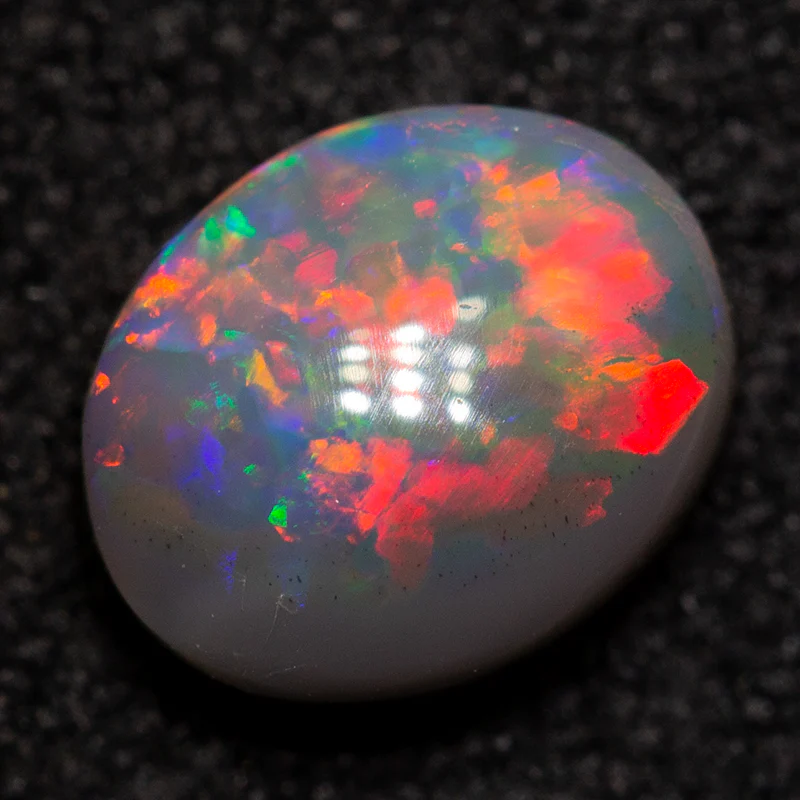 0.79 ct dark opal 7x5.7x3.2mm - Image 2