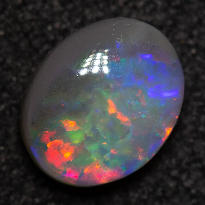 0.79 ct dark opal 7x5.7x3.2mm - Image 3