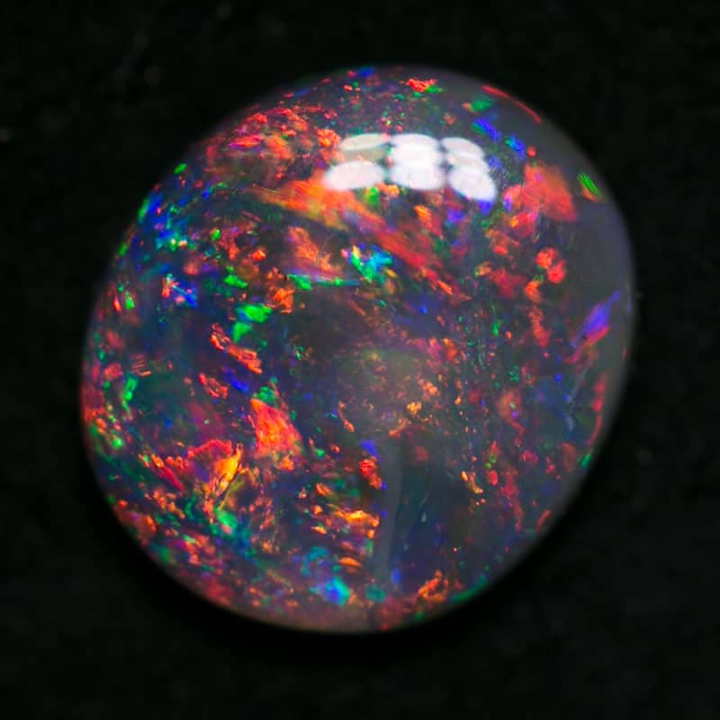 0.79 ct dark opal 7x6.5x2mm - Image 2