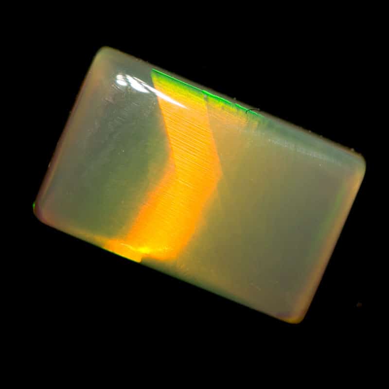 0.79 ct dark opal pillow cut with cats eye pattern 8x5x2mm - Image 4