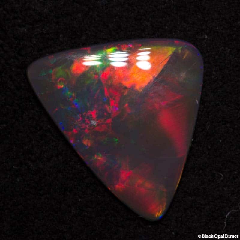 0.79 ct semi black opal triangle 9x8x1.5mm - Image 2