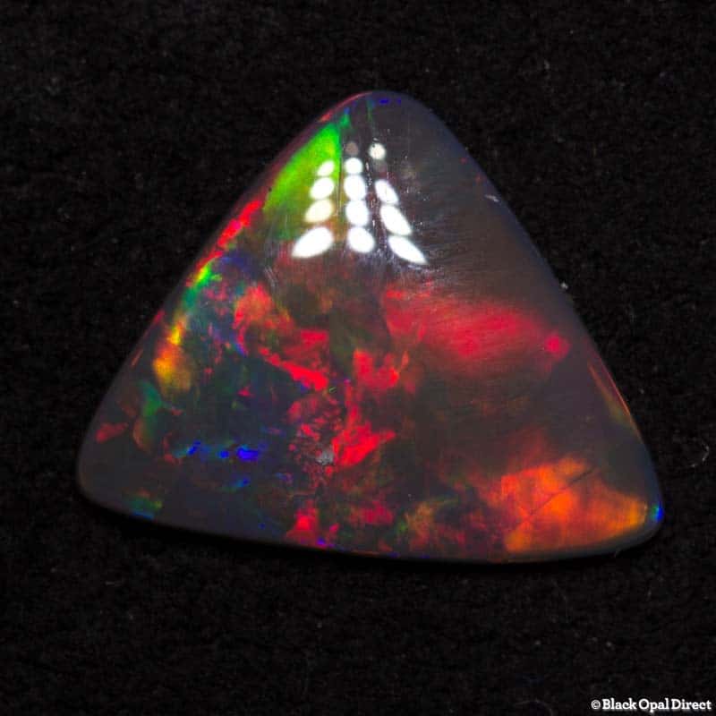 0.79 ct semi black opal triangle 9x8x1.5mm - Image 3
