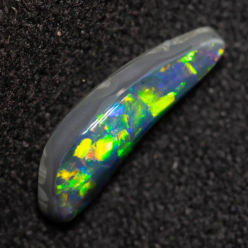 0.80 ct black opal 11.5x4.4x3mm - Image 4