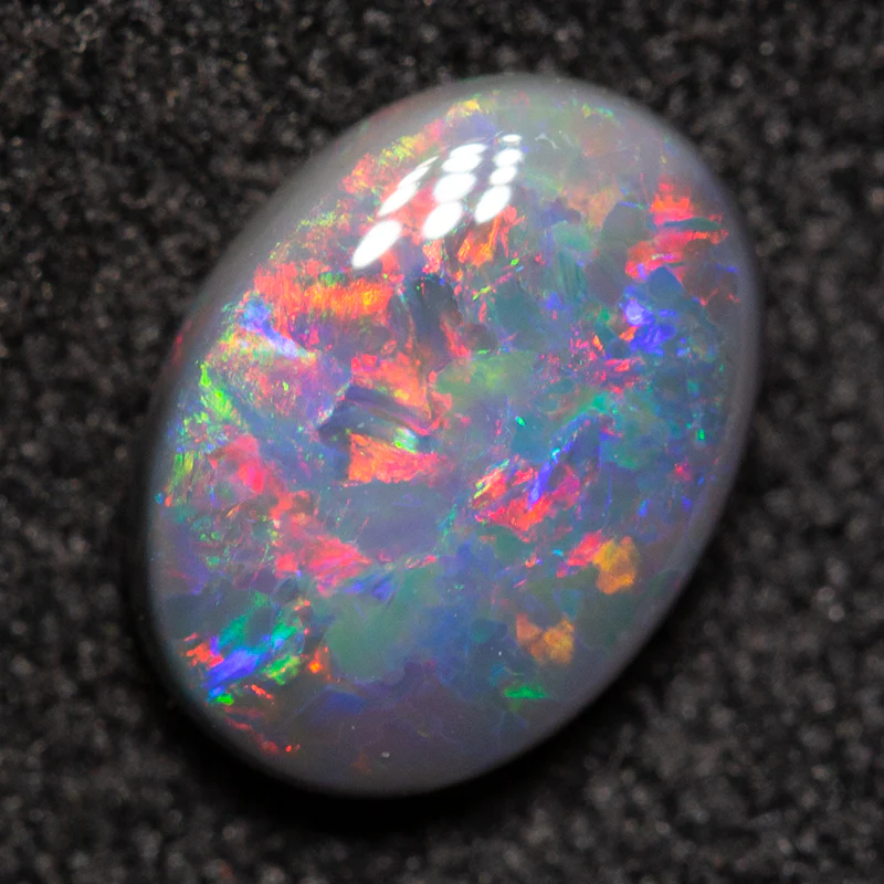 0.80 ct black opal 7.7x5.7x2.7mm - Image 3
