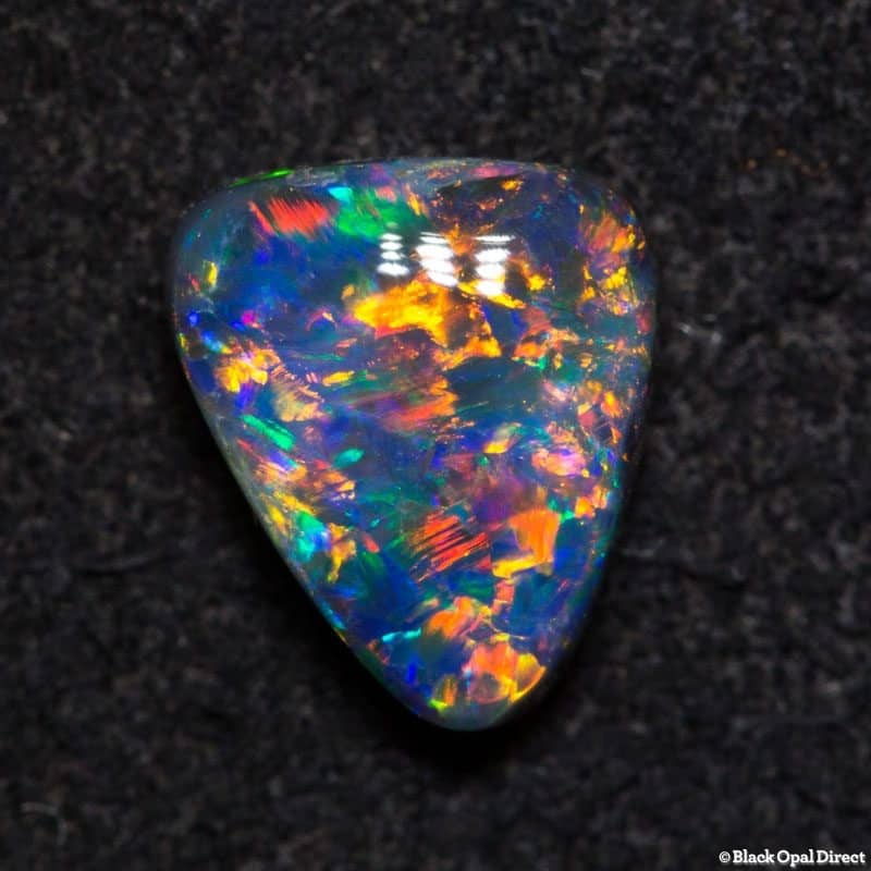 0.80 ct black opal triangle gem 7x6x2.8mm - Image 3