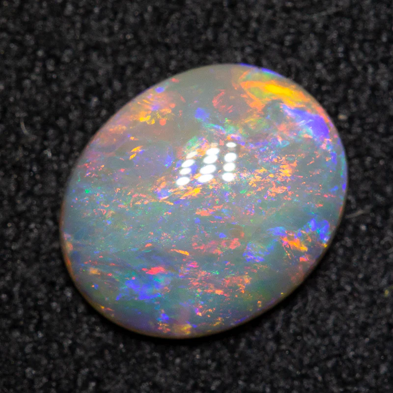 0.80 ct dark opal 7.9x6.5x2.4mm - Image 2