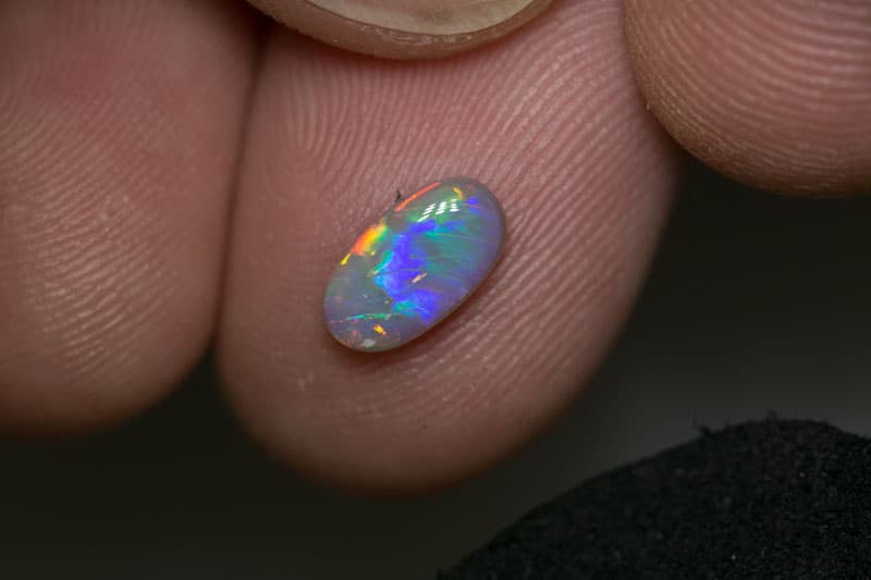 0.80 ct dark opal 9x5x2mm - Image 2