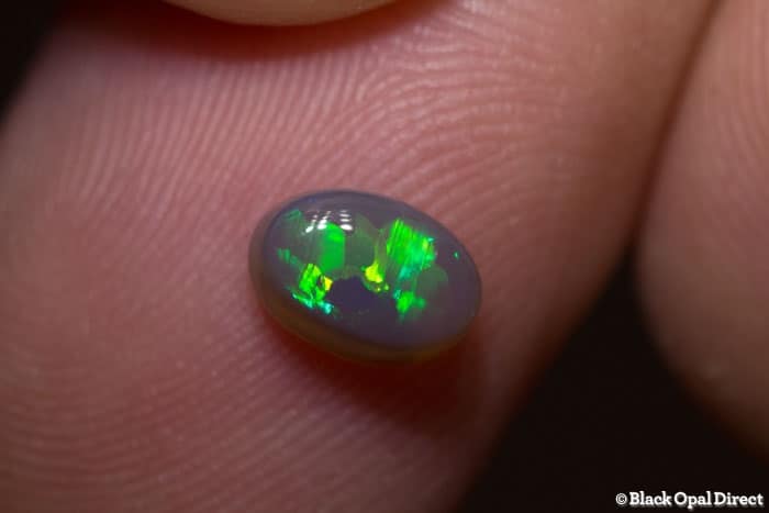 0.80 ct semi black opal 7x4x3mm - Image 2