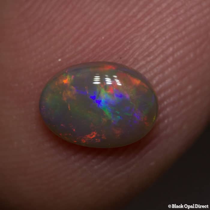 0.80 ct semi black opal 8x5.5x3mm - Image 2