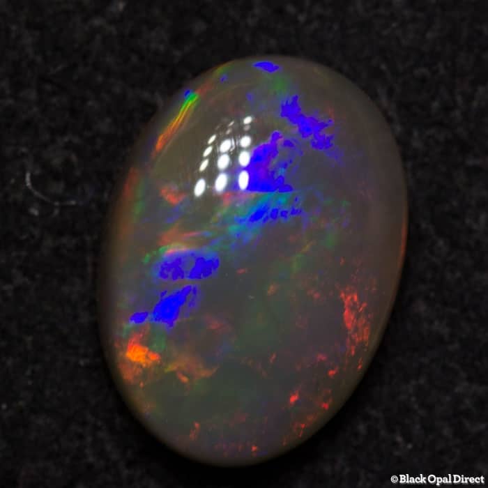 0.80 ct semi black opal 8x5.5x3mm - Image 3