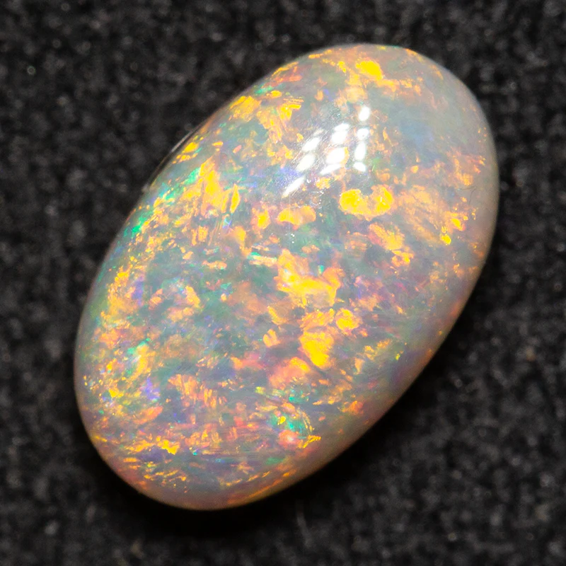 0.80 ct white opal 7.7x4.8x3.3mm - Image 2