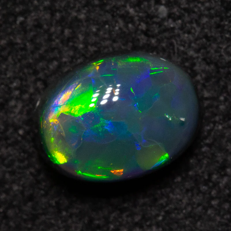 0.81 ct black opal 6.5x4.9x3.9mm - Image 2
