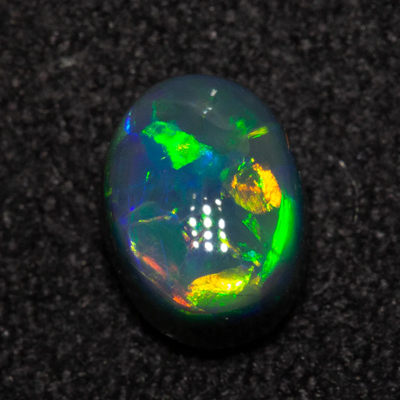 0.81 ct black opal 6.5x4.9x3.9mm - Image 3