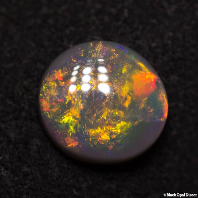 0.81 ct black opal 6.5x6x2.5mm - Image 3