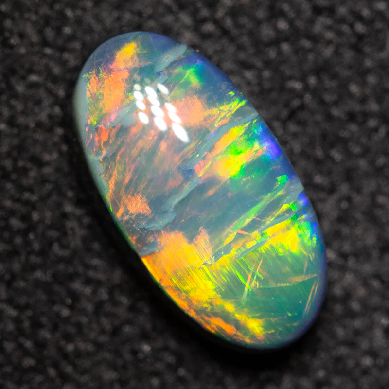 0.81 ct black opal 8.5x4.4x3mm - Image 3