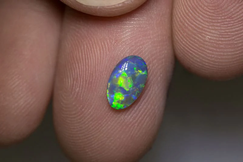 0.81 ct black opal 9x5x2mm - Image 3