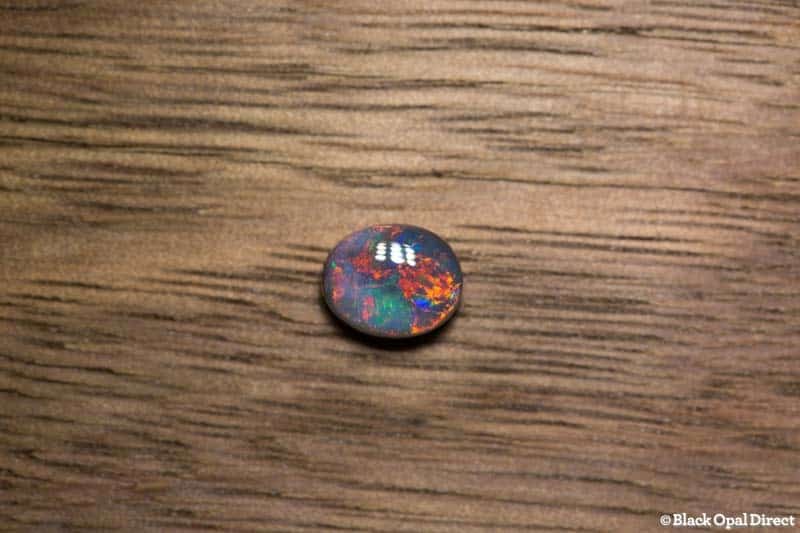 0.81 ct black opal gem 6.5x5x3mm - Image 3