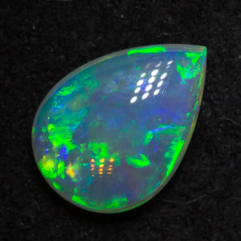 0.81 ct crystal opal 8x6x3mm - Image 2
