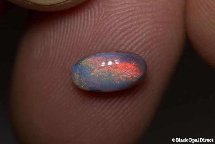 0.81 ct semi black opal 9x5x3mm - Image 3