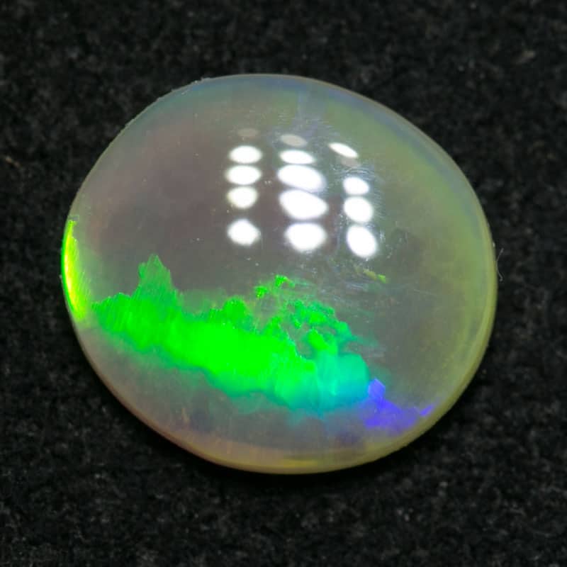 0.82 cats eye pattern crystal opal 7.5x7x2mm - Image 2