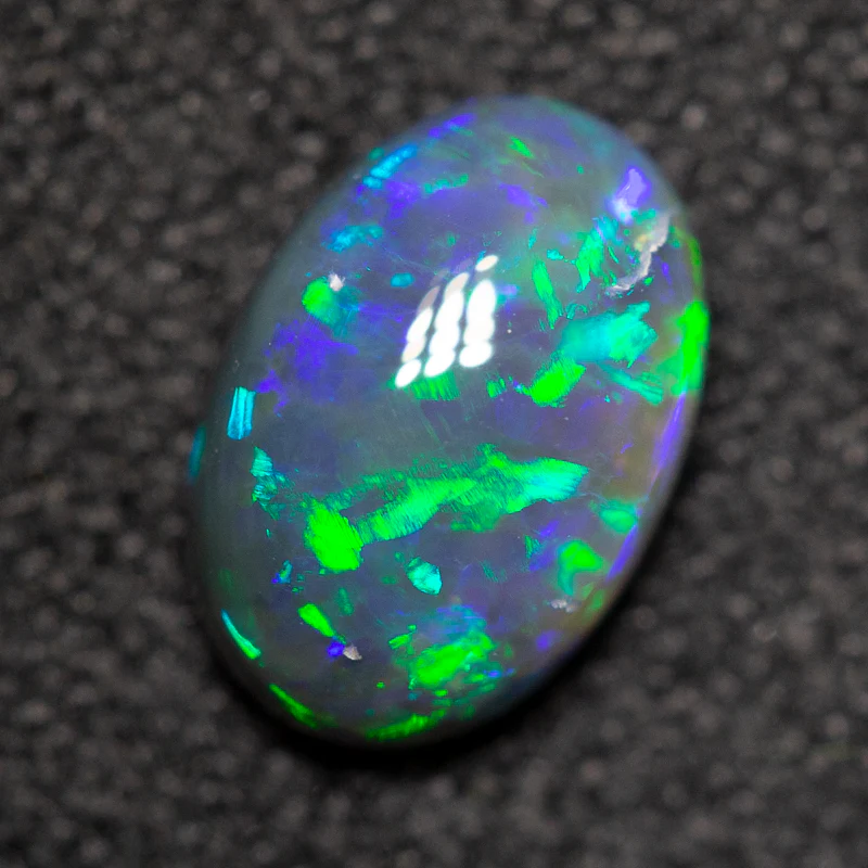 0.82 ct black crystal opal 7.8x5.4x3.3mm - Image 2