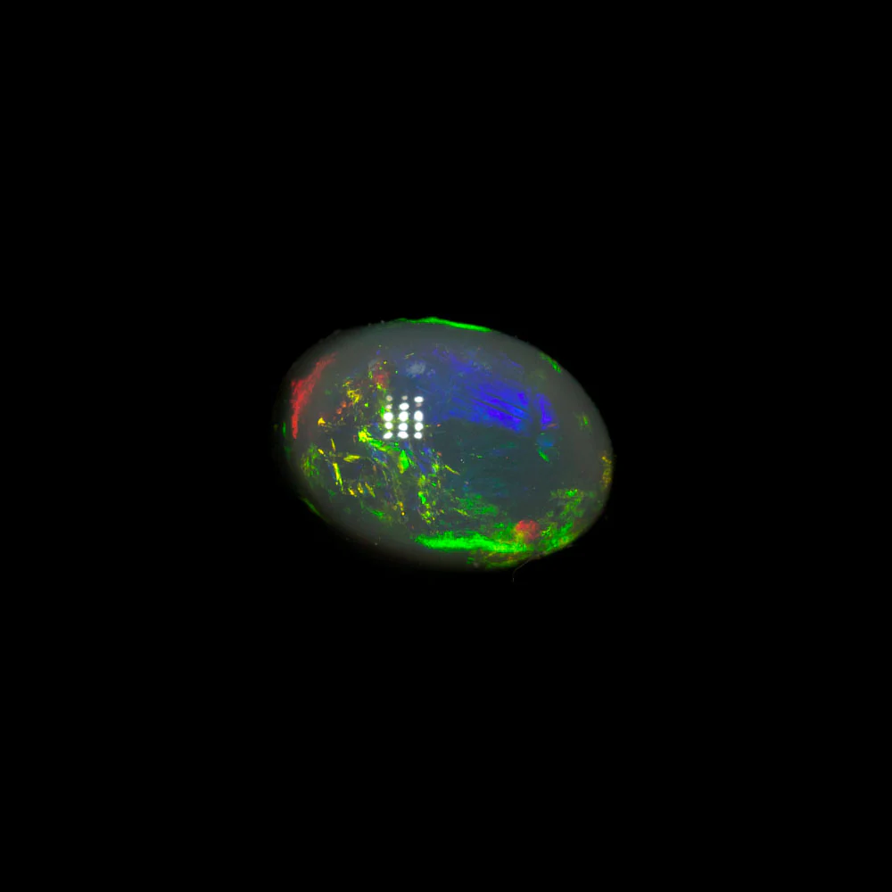 0.82 ct black opal 6.9x5.1x3.8mm - Image 2