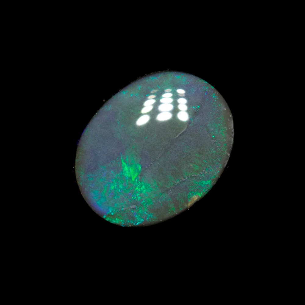 0.82 ct black opal 7.1x5.7x2.8mm - Image 2