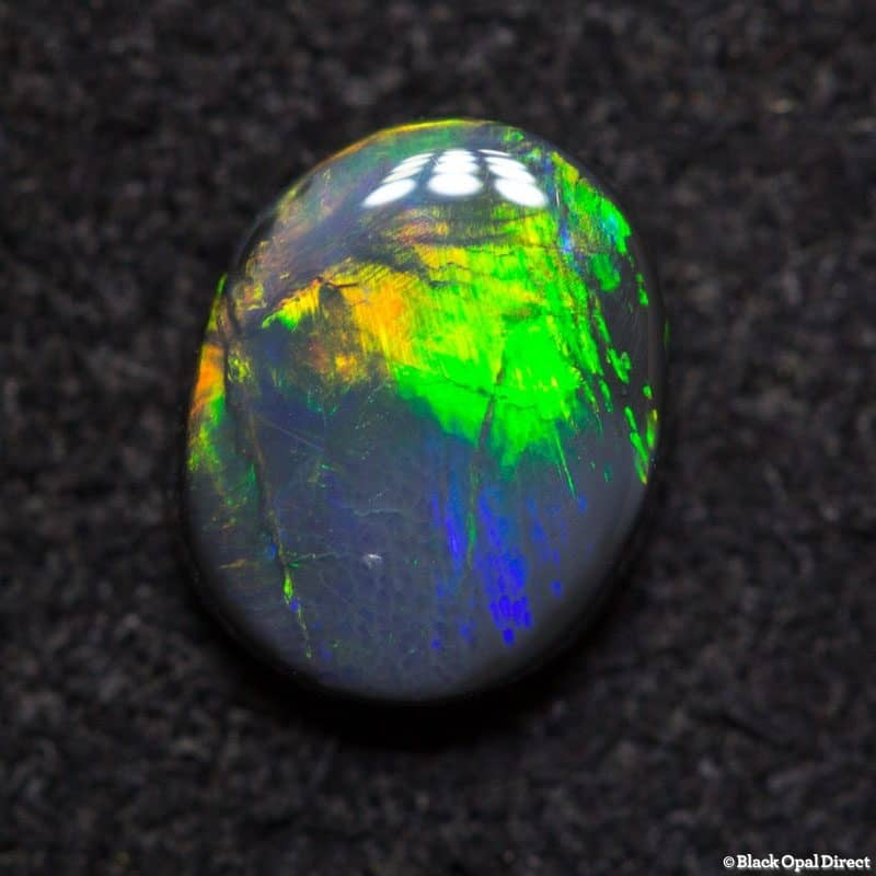 0.82 ct black opal 7x5.5x2mm - Image 3