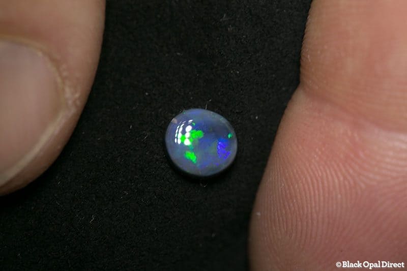 0.82 ct black opal 7x6x2.5mm - Image 2