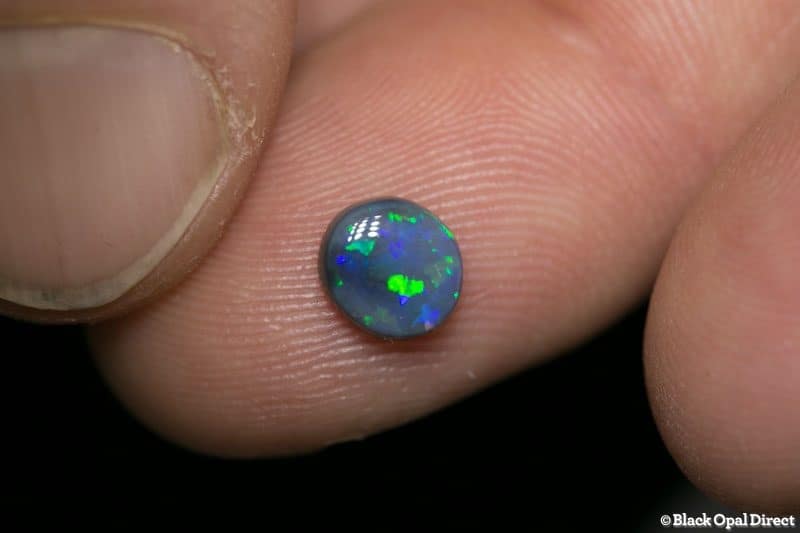 0.82 ct black opal 7x6x2.5mm - Image 3