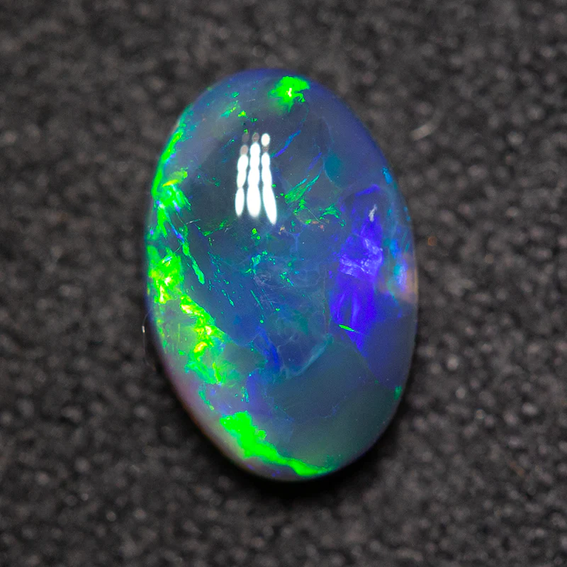 0.82 ct black opal 8x5.3x3mm - Image 3