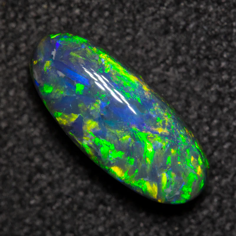 0.82 ct black opal 9.1x4x3.3mm - Image 2
